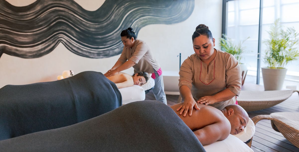 Man and woman getting a massage