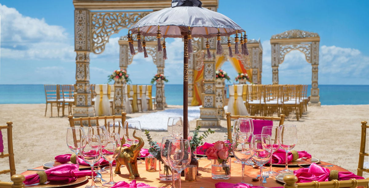 Indian culturally themed wedding setup along beach