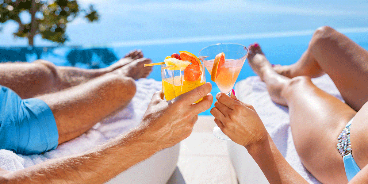 Couple holding drinks