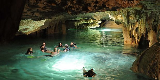 People swimming in water